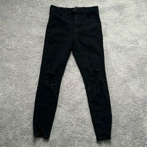 American Eagle Knee-Ripped Jeans.